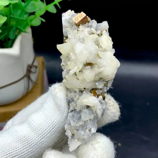 Tall spire of white calcite and quartz with brassy pyrite from Shangbao, Hunan, China