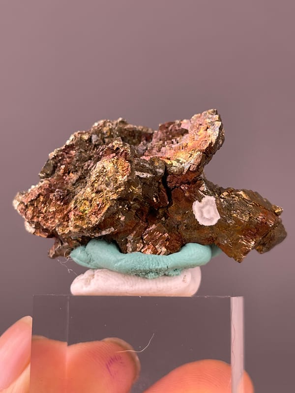 Pyrite specimen from Longyan, Fujian, China featuring coppery-brown tarnished metallic crystals