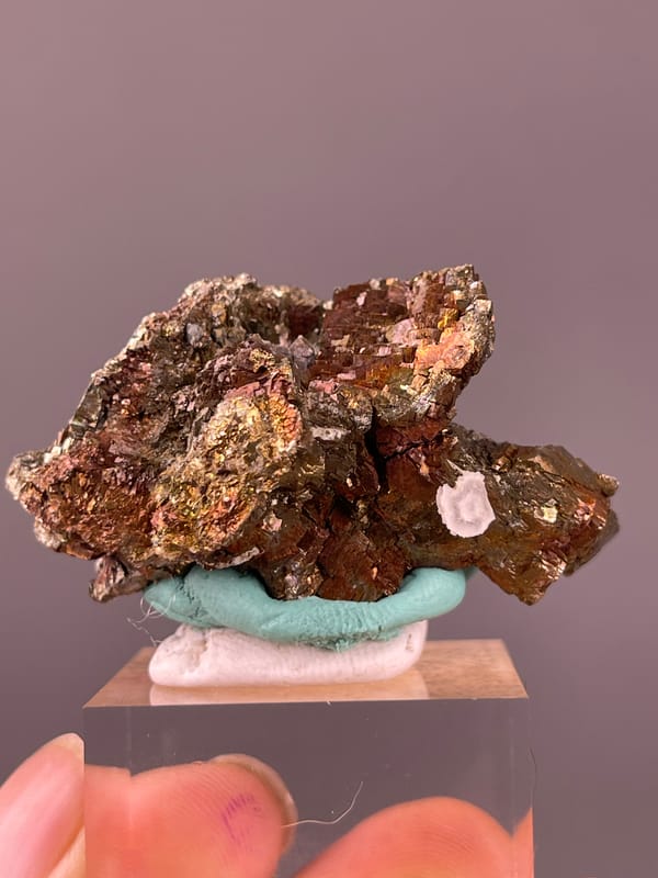 Pyrite specimen from Longyan, Fujian, China showing coppery-brown tarnished metallic crystals