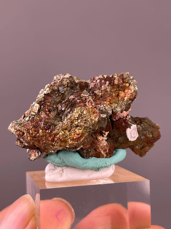 Pyrite specimen from Longyan, Fujian, China, defined by coppery-brown tarnished metallic crystals