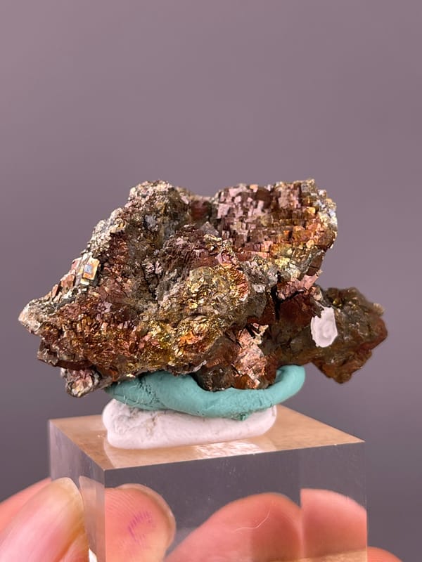 Pyrite specimen from Longyan, Fujian, China presenting coppery-brown tarnished metallic crystals