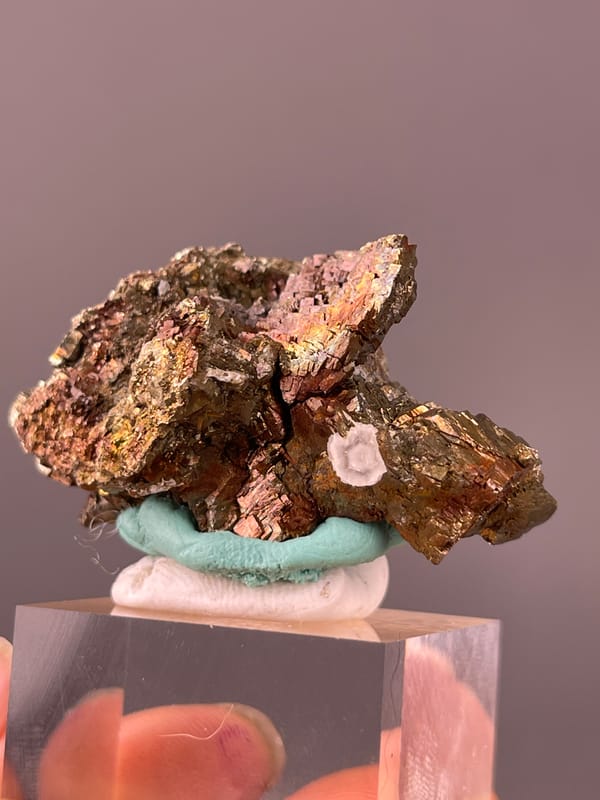Coppery-brown tarnished metallic crystals visible on pyrite specimen from Longyan, Fujian, China