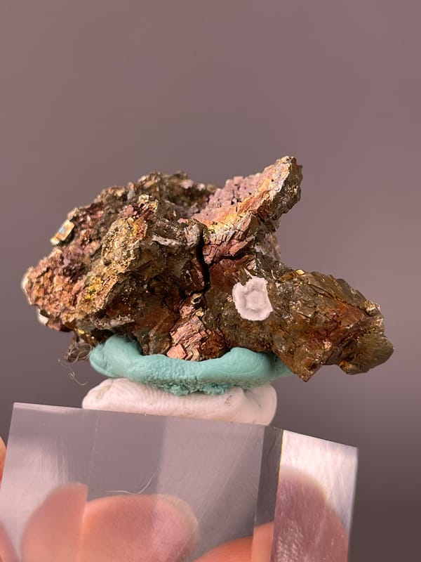 Pyrite specimen from Longyan, Fujian, China displaying coppery-brown tarnished metallic crystals