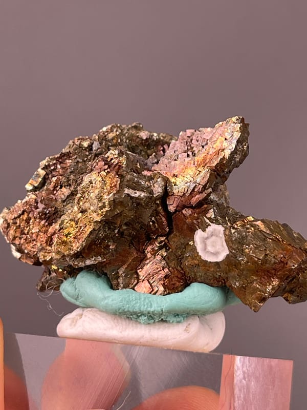 Pyrite specimen from Longyan, Fujian, China, characterized by coppery-brown tarnished metallic crystals