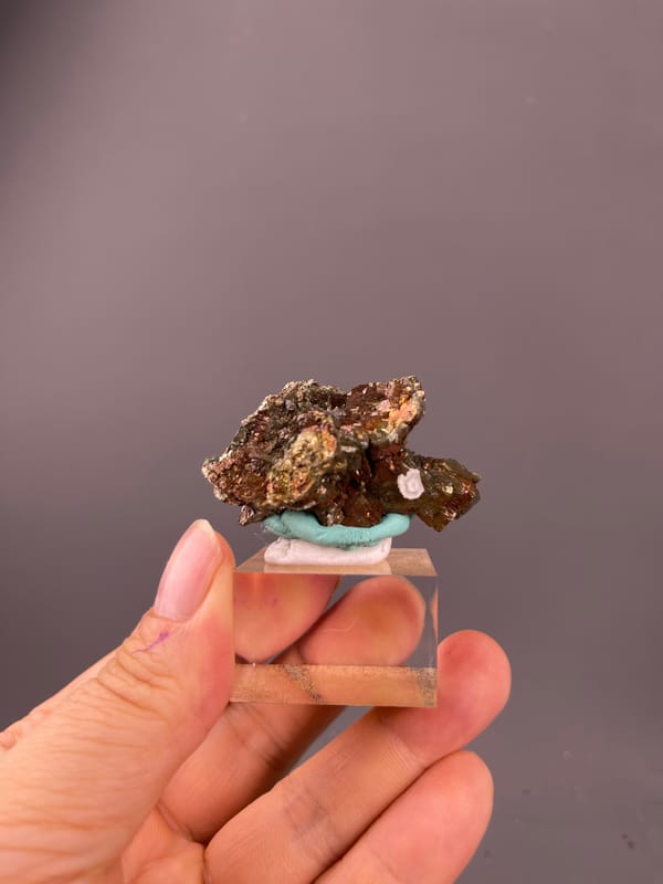 Pyrite specimen from Longyan, Fujian, China bearing coppery-brown tarnished metallic crystals