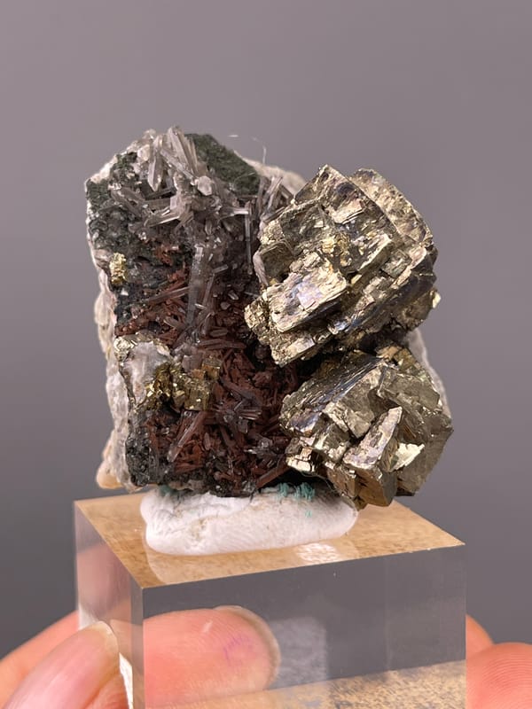 Pyrite specimen from Longyan, Fujian, China showing striated silver-brassy blocky crystals