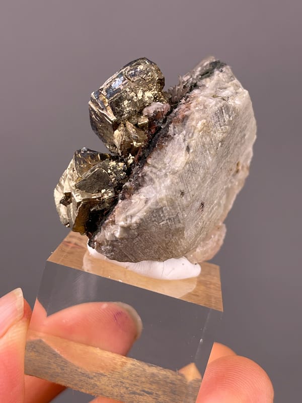 Pyrite specimen from Longyan, Fujian, China displaying striated silver-brassy blocky crystals