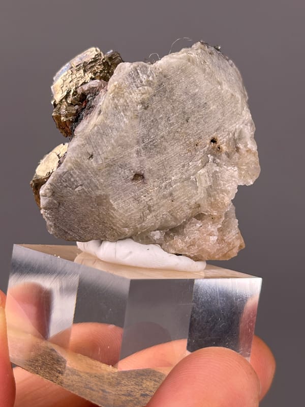 Striated silver-brassy blocky crystals on natural pyrite specimen from Longyan, Fujian, China