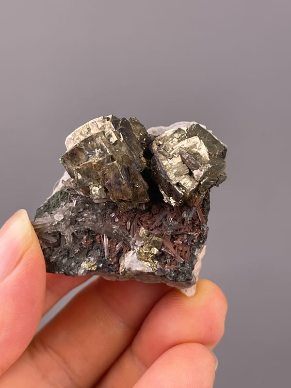 Pyrite specimen from Longyan, Fujian, China, characterized by striated silver-brassy blocky crystals