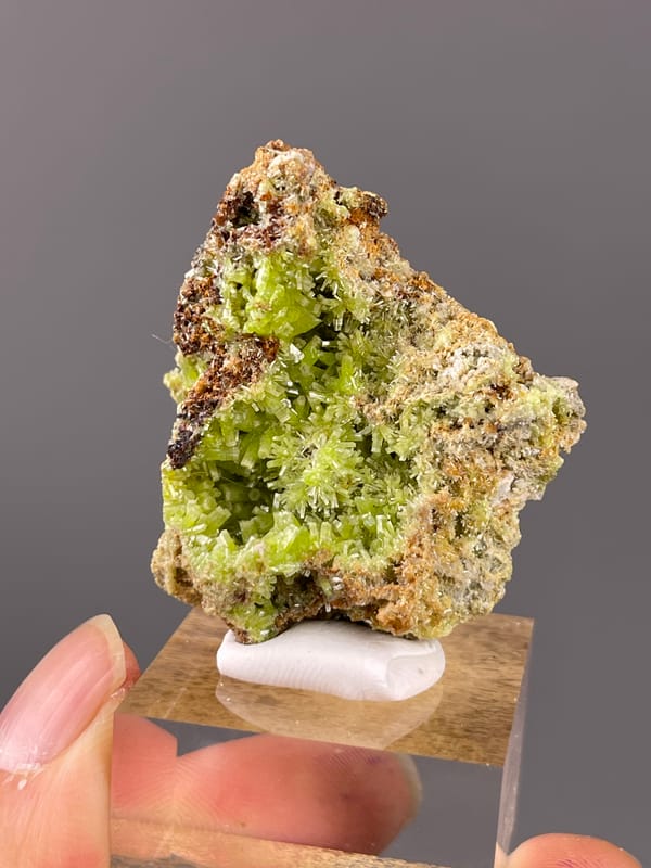 Pyromorphite specimen from Guangxi, China showing lime-green hexagonal cavity crystals