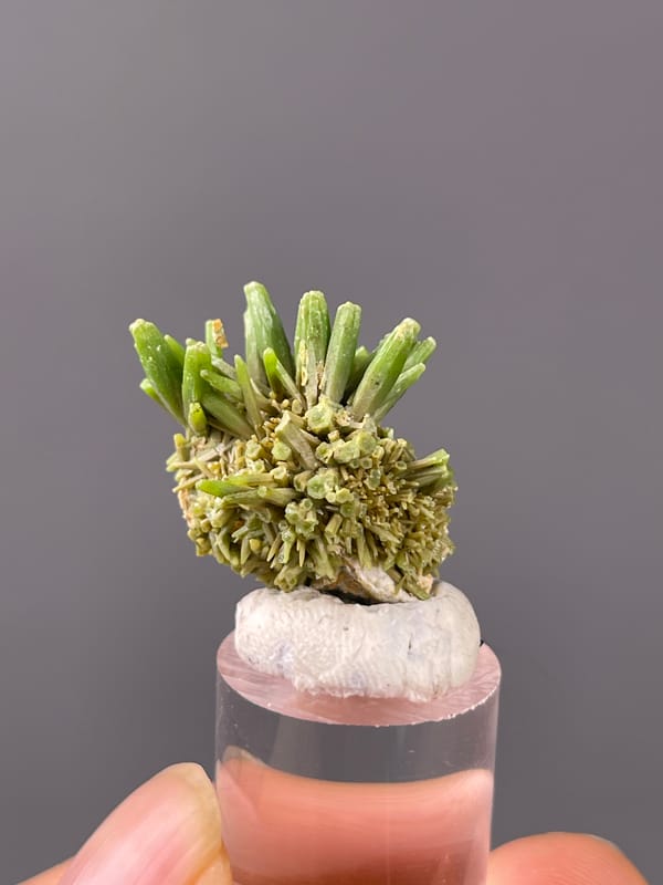 Pyromorphite specimen showing green diverging hexagonal prisms distinctly