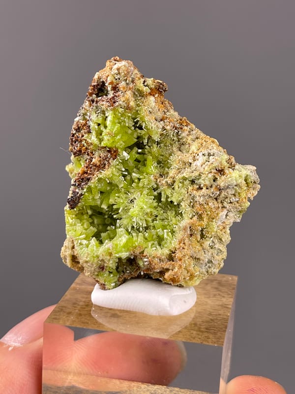 Pyromorphite specimen from Guangxi, China, defined by lime-green hexagonal cavity crystals