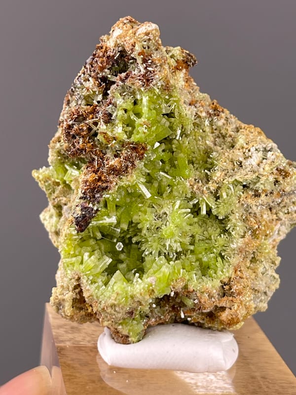 Lime-green hexagonal cavity crystals visible on pyromorphite specimen from Guangxi, China