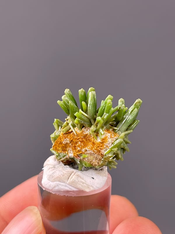 Pyromorphite specimen displaying green diverging hexagonal prisms prominently