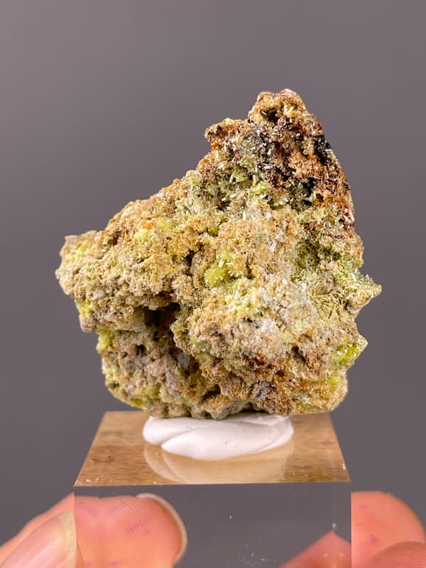 Pyromorphite specimen from Guangxi, China highlighting lime-green hexagonal cavity crystals