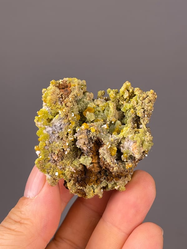 Pyromorphite specimen from Guangxi, China bearing olive hexagonal crystal cluster
