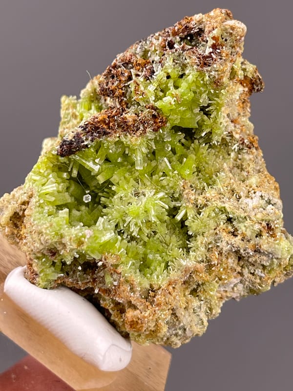 Pyromorphite specimen from Guangxi, China bearing lime-green hexagonal cavity crystals