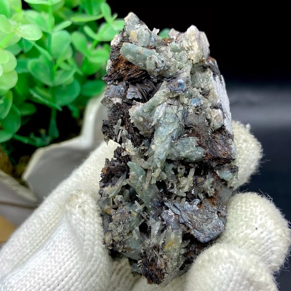 Pale green quartz needles with specular hematite from Inner Mongolia, China, view 2 of 9