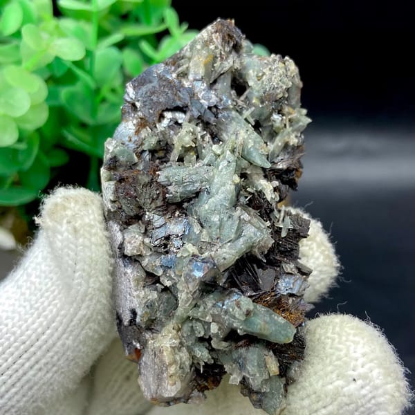 Pale green quartz needles with specular hematite from Inner Mongolia, China, view 3 of 9