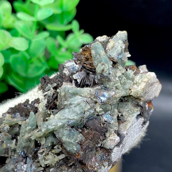 Pale green quartz needles with specular hematite from Inner Mongolia, China, view 7 of 9