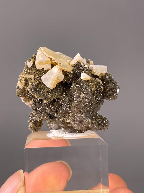 Cream crystals over dark sulfides clearly visible on this quartz specimen