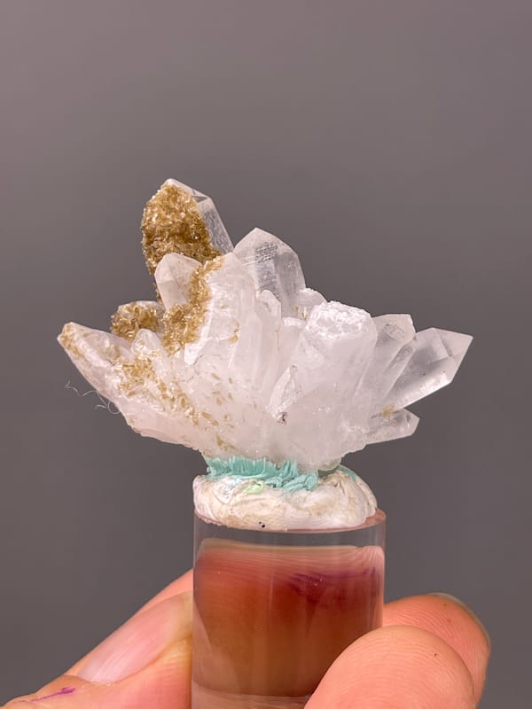 Quartz specimen from Longyan, Fujian, China featuring clear quartz fan with brown coating