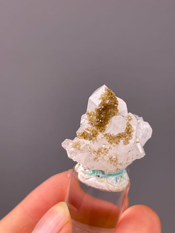 Clear quartz fan with brown coating visible on quartz specimen from Longyan, Fujian, China