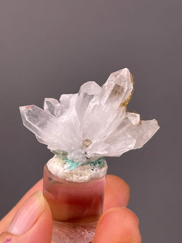 Quartz specimen from Longyan, Fujian, China displaying clear quartz fan with brown coating