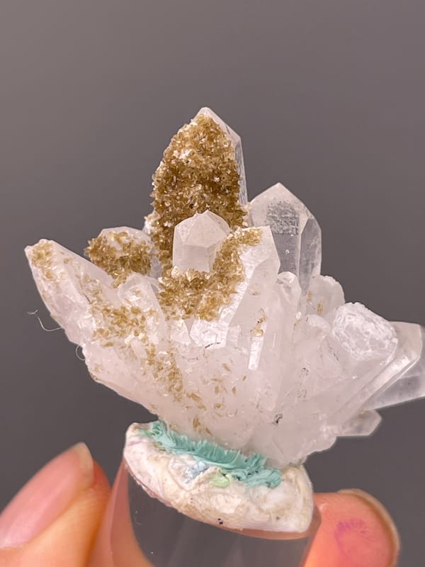 Clear quartz fan with brown coating on natural quartz specimen from Longyan, Fujian, China