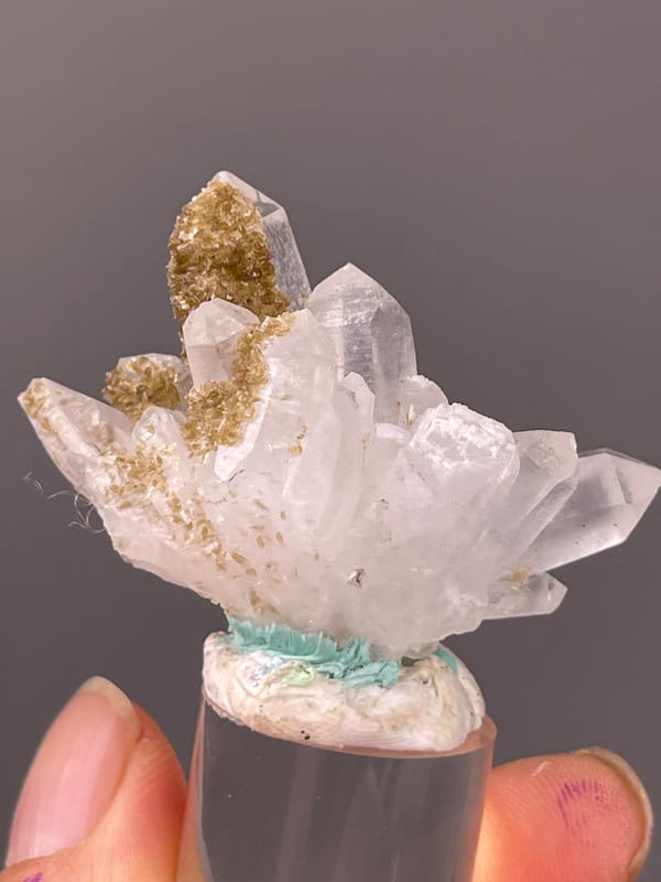 Quartz specimen from Longyan, Fujian, China highlighting clear quartz fan with brown coating