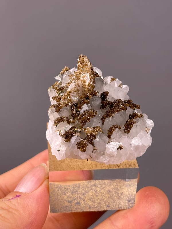 Quartz specimen from Longyan, Fujian, China showing white quartz with brown coating