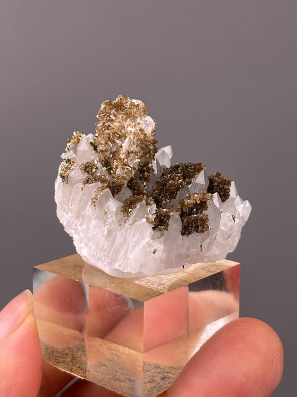 Quartz specimen from Longyan, Fujian, China presenting white quartz with brown coating