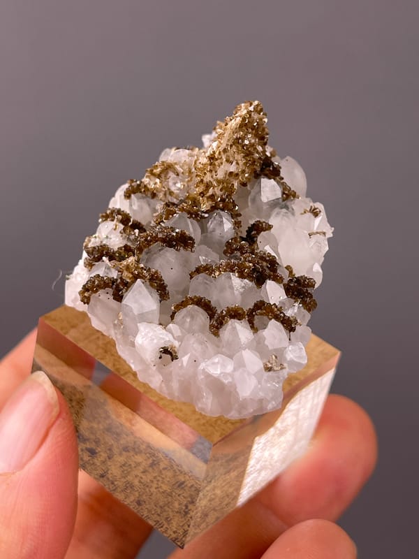 White quartz with brown coating on natural quartz specimen from Longyan, Fujian, China