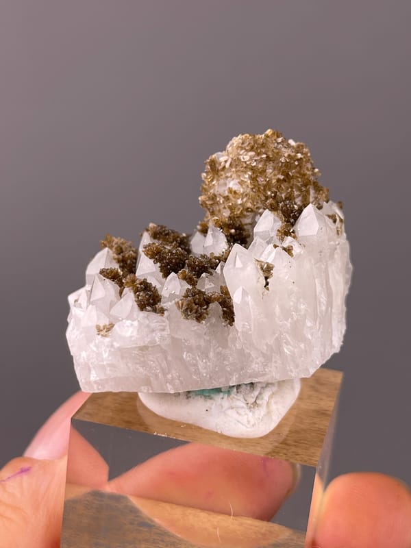 Quartz specimen from Longyan, Fujian, China highlighting white quartz with brown coating