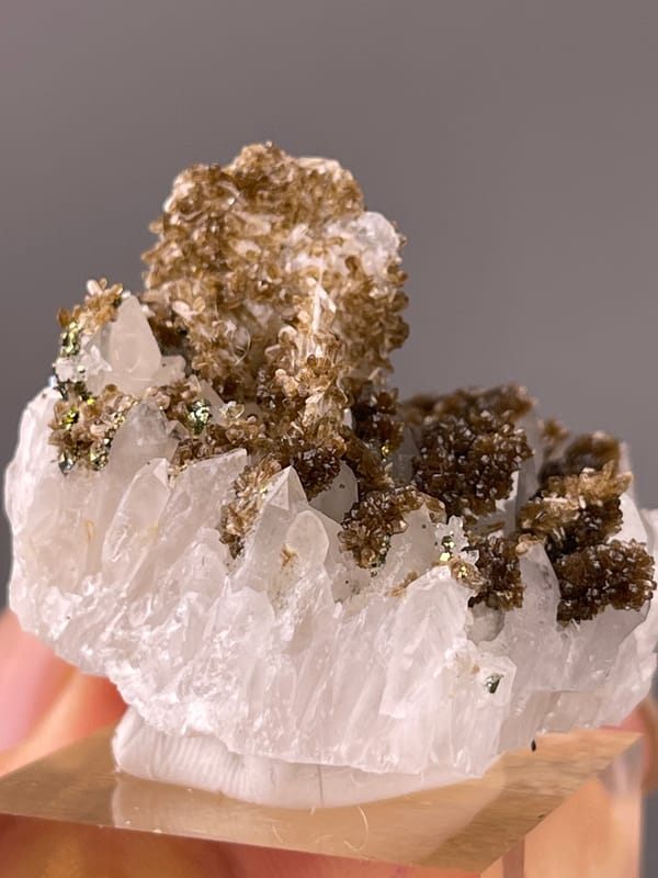 Quartz specimen from Longyan, Fujian, China bearing white quartz with brown coating