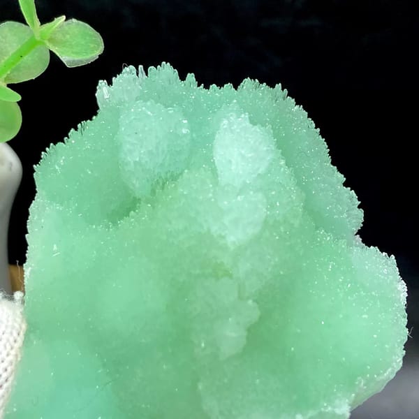 Mint-green radiating aragonite with sugary skin from Sichuan, China, view 7 of 9