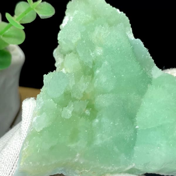 Mint-green radiating aragonite peak with sugary skin from Sichuan, China, view 7 of 9