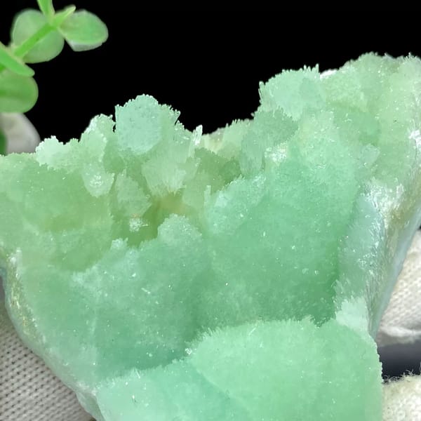 Mint-green radiating aragonite peak with sugary skin from Sichuan, China, view 8 of 9