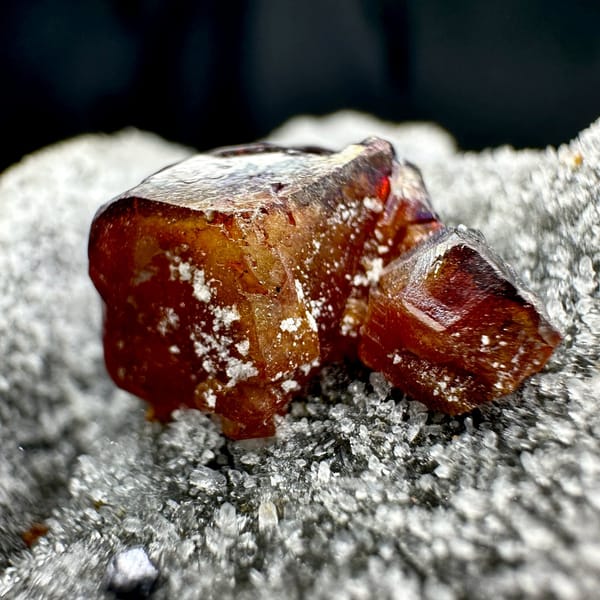 Single red gem sphalerite crystal on grey quartz druse from Hunan, China, view 6 of 11