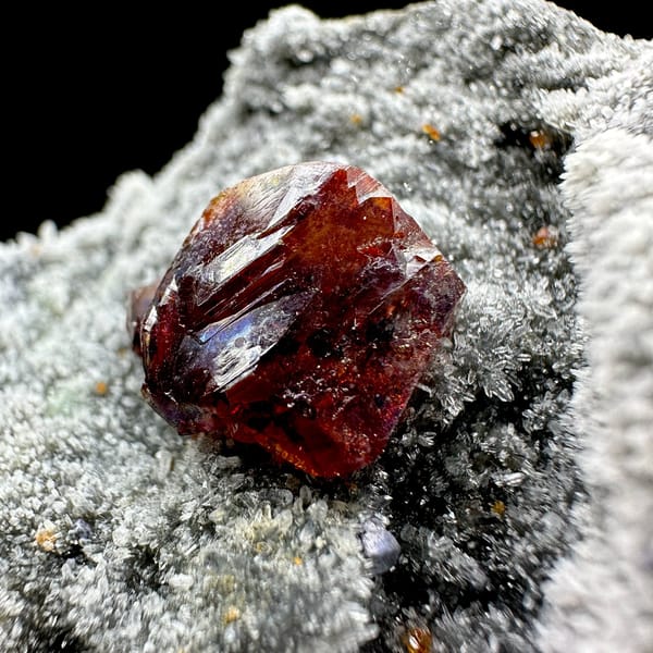 Single red gem sphalerite crystal on grey quartz druse from Hunan, China, view 10 of 11