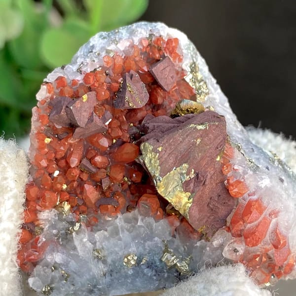 Red-skinned quartz with large chalcopyrite crystal from Jiangxi, China, view 7 of 9