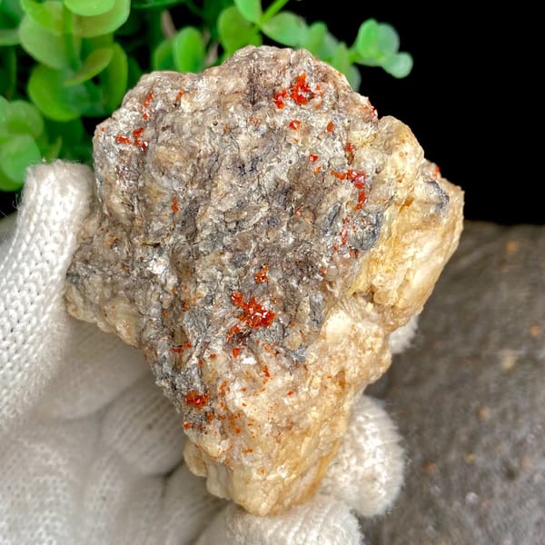 Red wulfenite spots over pale matrix block from Sichuan, China, view 9 of 9