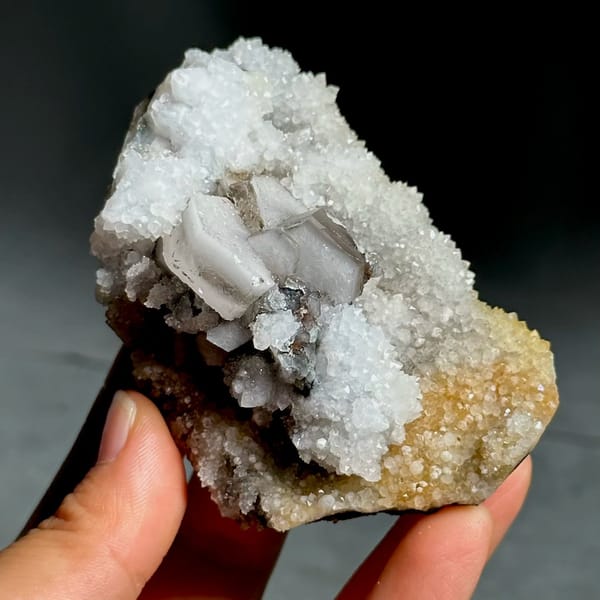 Hexagonal sandwich calcite plates on yellow-stained quartz from Fujian, China, view 4 of 11