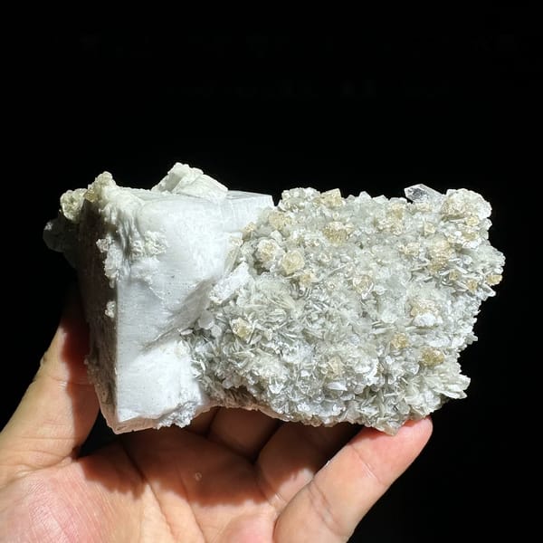 Large feldspar crystal with scheelite, aquamarine and muscovite from Xuebaoding, Sichuan, China