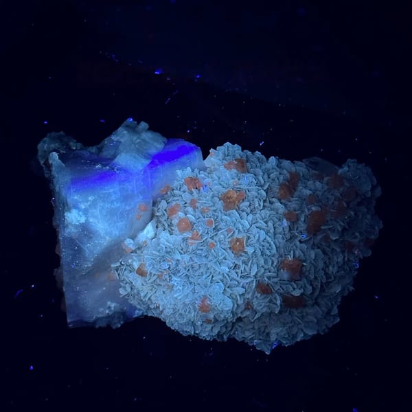 Large feldspar crystal with scheelite, aquamarine and muscovite from Xuebaoding, Sichuan, China, second angle