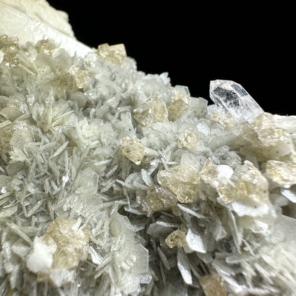 Large feldspar crystal with scheelite, aquamarine and muscovite from Xuebaoding, Sichuan, China, reverse side
