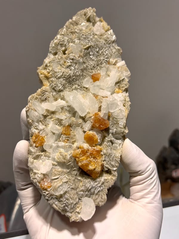 Mica plate with scheelite, aquamarine and fluorite from Xuebaoding, Sichuan, China, second angle