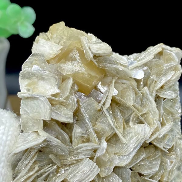 Honey scheelite crystal on silvery mica blades from Sichuan, China, view 3 of 9