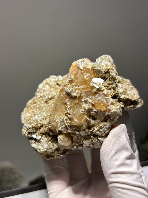 Golden mica plate with scheelite from Xuebaoding, Sichuan, China, second angle