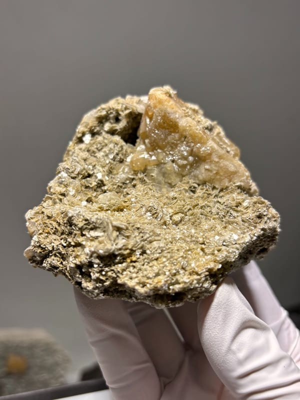 Golden mica plate with scheelite from Xuebaoding, Sichuan, China, reverse side